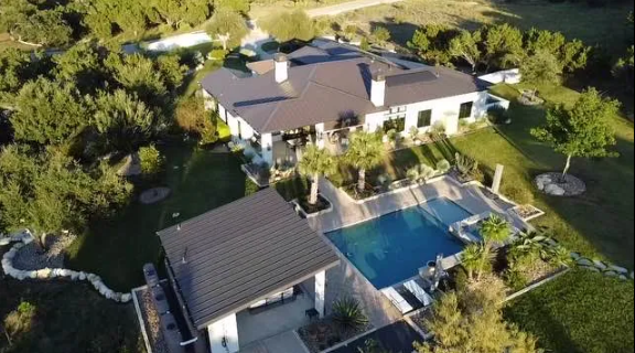 Aerial view of a house with new roof